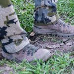 Hunter wearing KUIU camo pants and Danner hunting boots