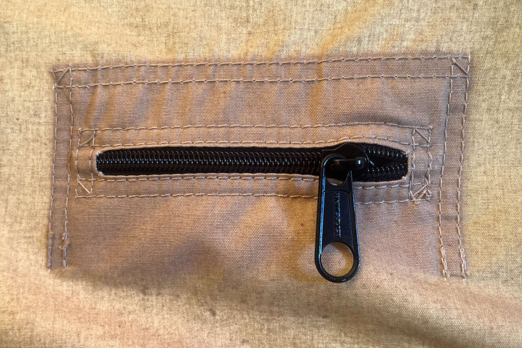 Zipper for cable and cord access