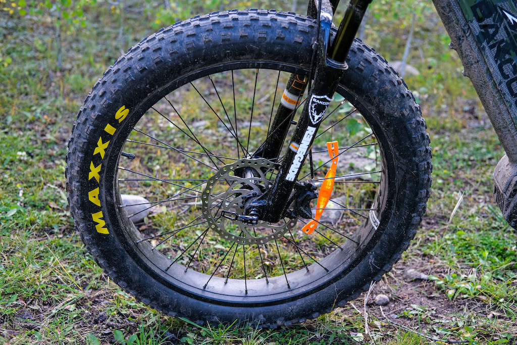 Close up of a fat bike tire that reads "MAXXIS"