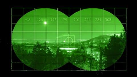 View of a city through night vision googles