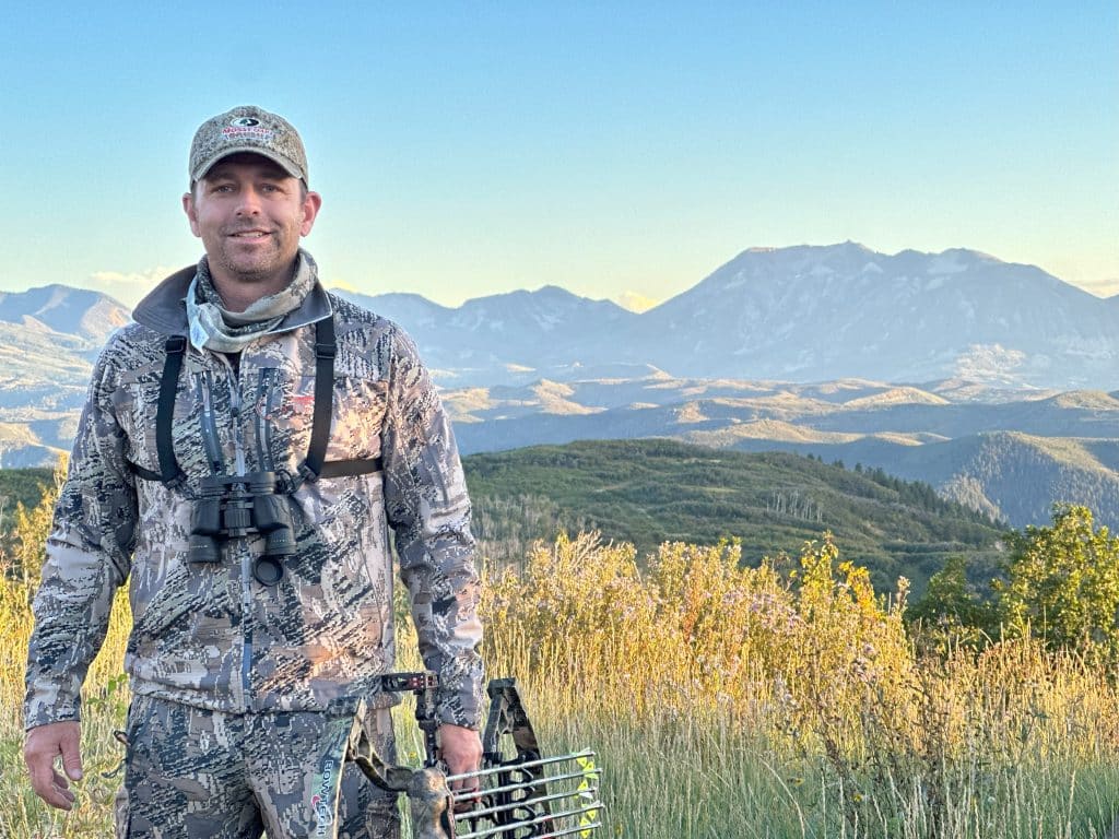 murdock the archery hunter stands ready to hit the hills with his bow and new zamberlan boots