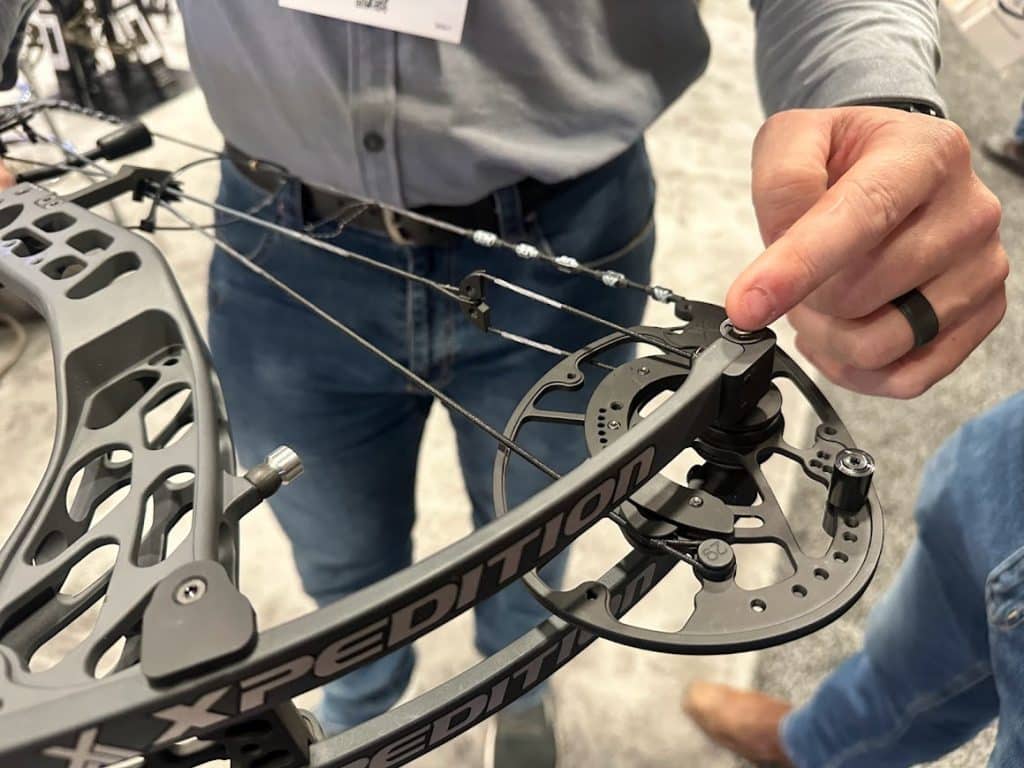 xpedition bow being presented by a bow technician